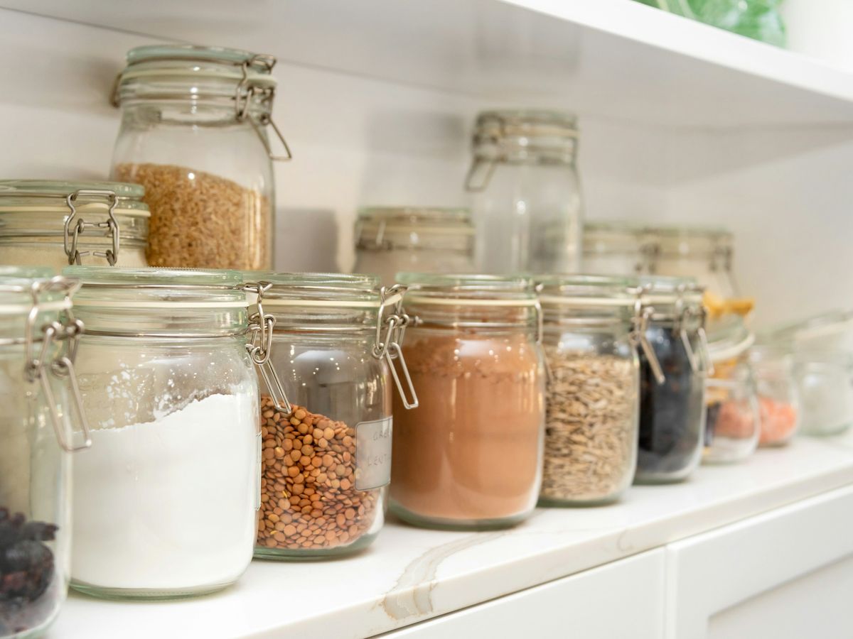 Neatly organised storage jars on a shelf